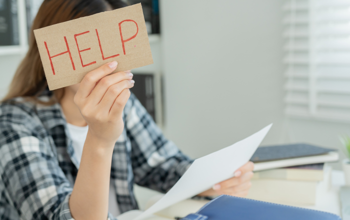 Woman with help sign