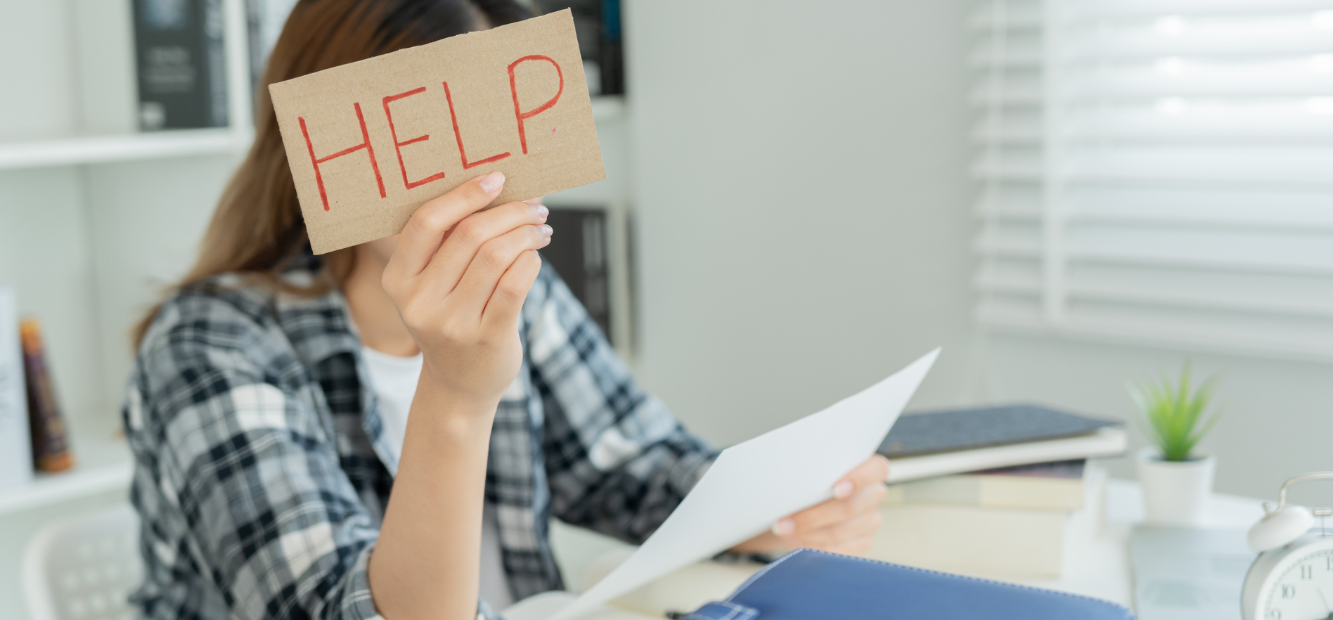 Woman with help sign